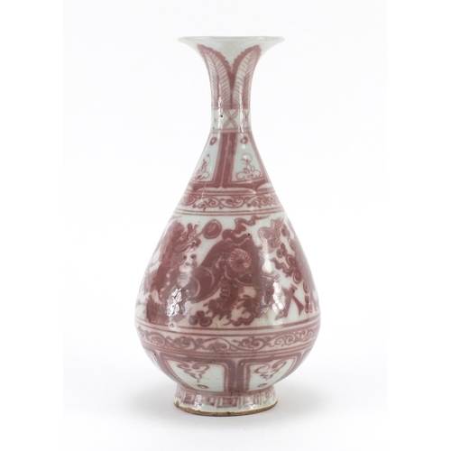 318 - Chinese porcelain vase hand painted in iron red with Qilins amongst clouds, 31cm high