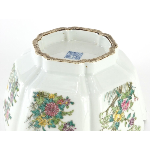 310 - Chinese porcelain bowl hand painted in the famille rose palette with panels of flowers, six figure c... 