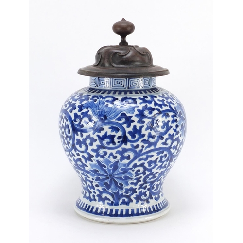 306 - Chinese blue and white porcelain baluster vase, hand painted with flower heads amongst scrolling fol... 