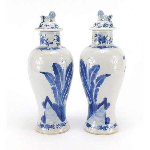 359 - Pair of Chinese blue and white baluster vases with covers, hand painted with figures, blue ring mark... 