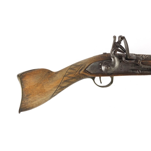 295 - Antique flint lock blunderbuss with engraved barrel, 51cm length