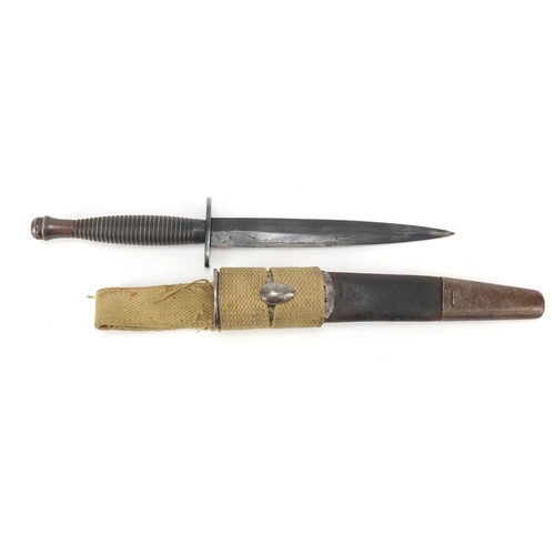 273 - Military Interest Fairburn Sykes fighting knife with sheath, 29.5cm in length