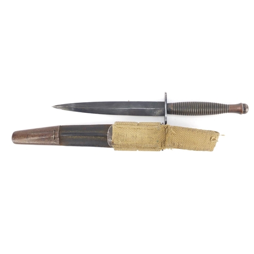 273 - Military Interest Fairburn Sykes fighting knife with sheath, 29.5cm in length