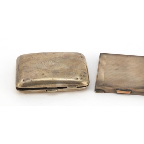 619 - Two rectangular silver cigarette cases and a compact with engine turned decoration, various hallmark... 