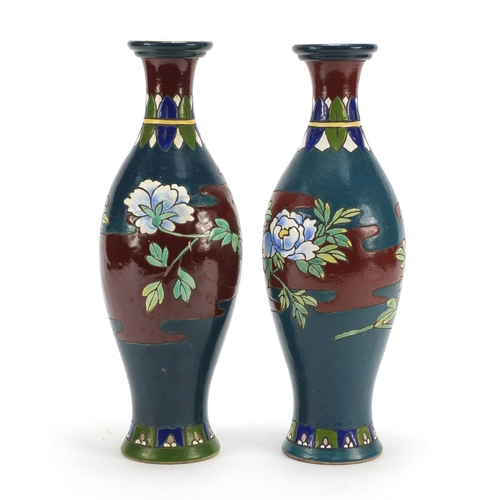 259 - Pair of Austrian pottery vases hand painted with flowers, 31cm high