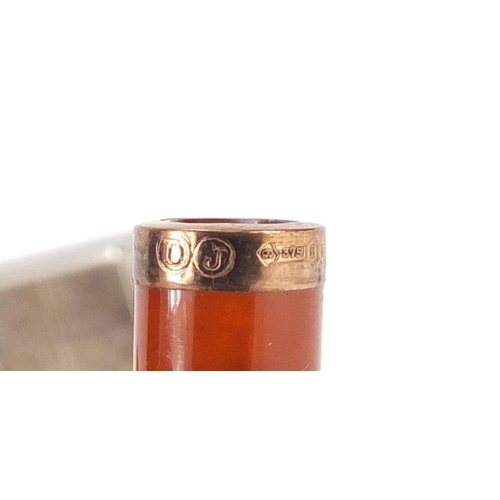3 - Objects including amber coloured cigarette holder with 9ct gold mount, Colibri silver plated pocket ... 