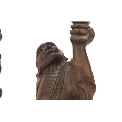 399 - Two Chinese root carvings of elders, the largest 21cm high