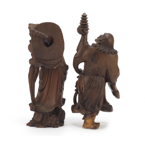 399 - Two Chinese root carvings of elders, the largest 21cm high