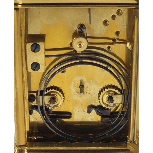 5 - Brass cased repeating carriage clock striking on a gong having an enamel dial with Roman numerals, 1... 