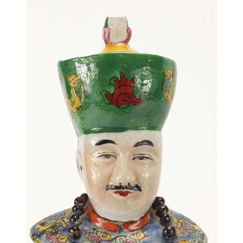 375 - Chinese porcelain comprising two ginger jars and a figure of an emperor, the largest 33.5cm high