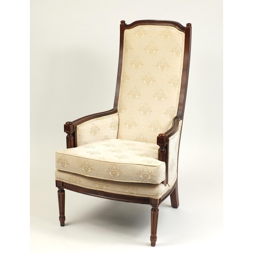 120 - Mahogany framed armchair with beige floral upholstery, 114cm high