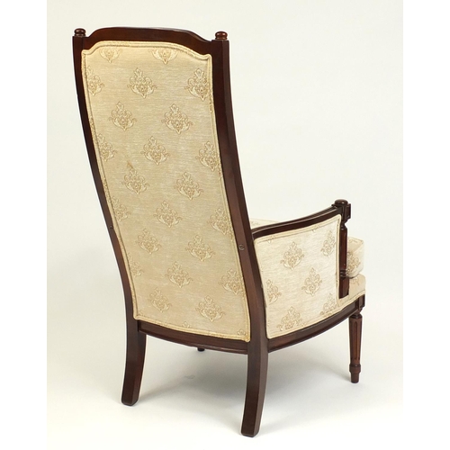 120 - Mahogany framed armchair with beige floral upholstery, 114cm high