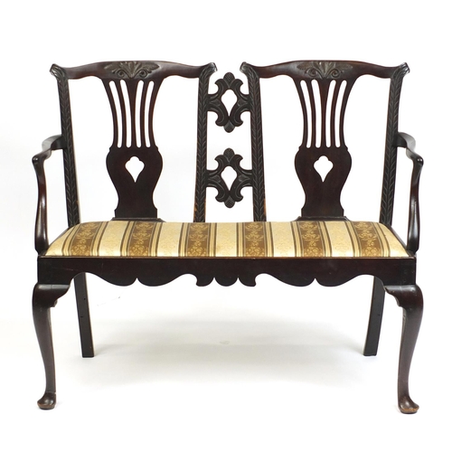 17 - Mahogany framed two seater salon settee with striped upholstery, 114cm in length
