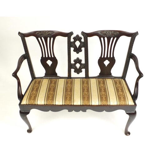 17 - Mahogany framed two seater salon settee with striped upholstery, 114cm in length