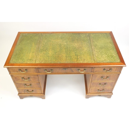 3 - Mahogany twin pedestal desk with tooled green leather top above an arrangement of drawers, 74cm H x ... 