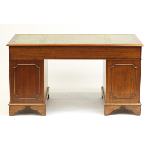 3 - Mahogany twin pedestal desk with tooled green leather top above an arrangement of drawers, 74cm H x ... 