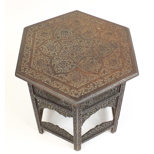 127 - Anglo-Indian carved wood occasional table with folding base, 62cm H x 60cm W x 60cm D