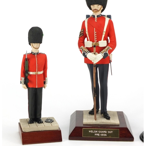 282 - Military figures including Welsh Guard SGT and Beefeater, the largest 30cm high