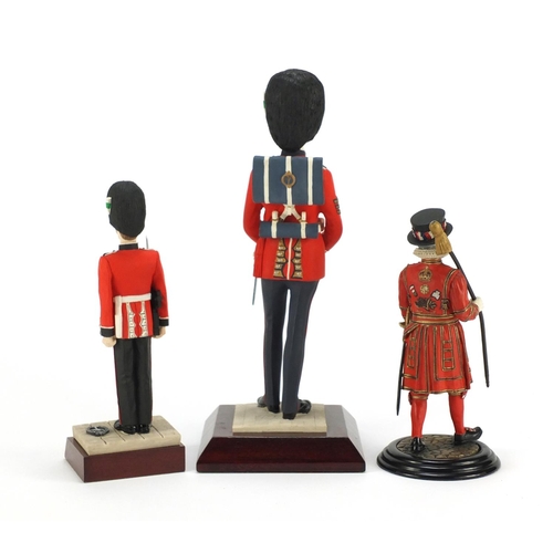 282 - Military figures including Welsh Guard SGT and Beefeater, the largest 30cm high