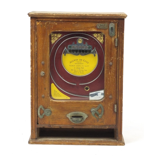 142 - 1920's oak cased Allwin De Luxe penny pinball slot machine, 69.5cm H x 51cm W x 19.5cm D