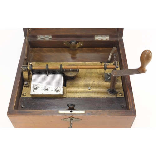 50 - Victorian inlaid walnut polyphone, numbered 74080, 16.5cm H x 24.3cm W x 21.5cm D