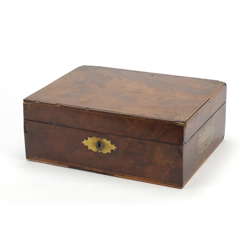 72 - Victorian cross banded walnut writing box with fitted leather interior, having silver coloured mount... 