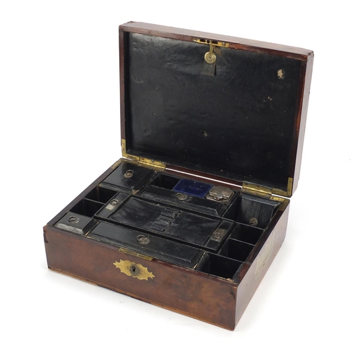 72 - Victorian cross banded walnut writing box with fitted leather interior, having silver coloured mount... 