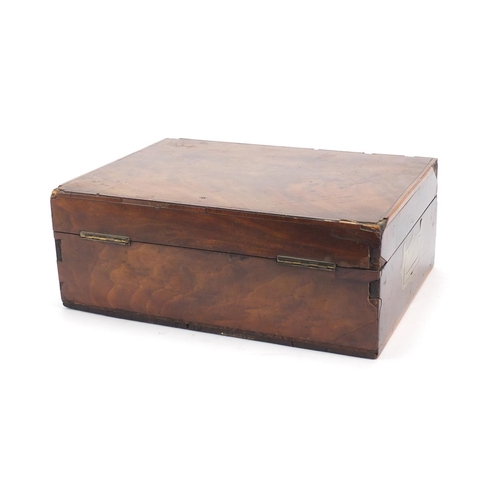 72 - Victorian cross banded walnut writing box with fitted leather interior, having silver coloured mount... 