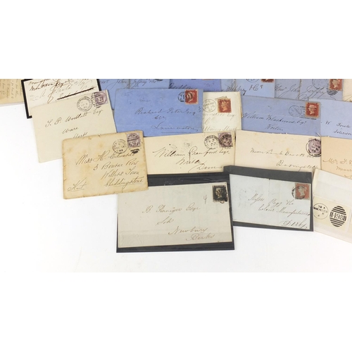 160 - Collection of Victorian postal history covers with penny red stamps in included a mourning cover wit... 