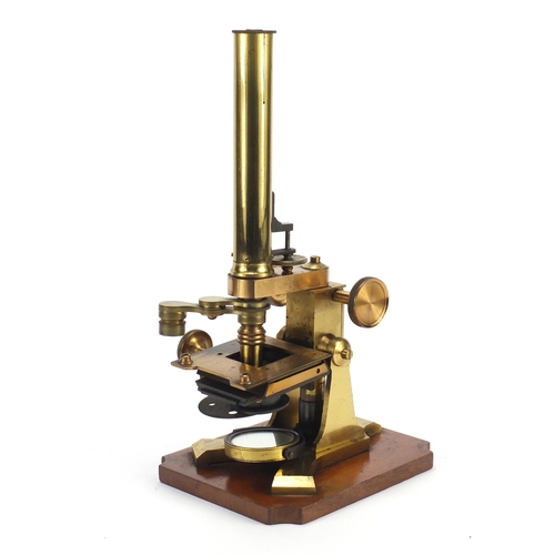 40 - Victorian brass microscope with accessories and case by J & C Arobbins of London, 34.5cm high