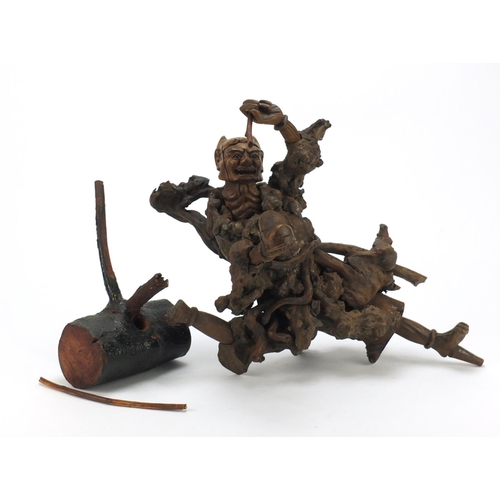 398 - Chinese hardwood root carving of a devil, approximately 40cm high