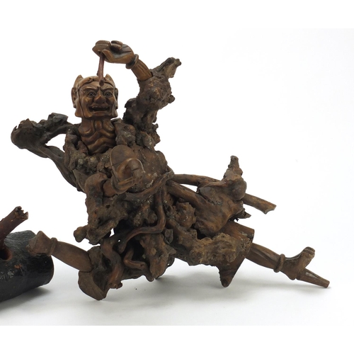 398 - Chinese hardwood root carving of a devil, approximately 40cm high