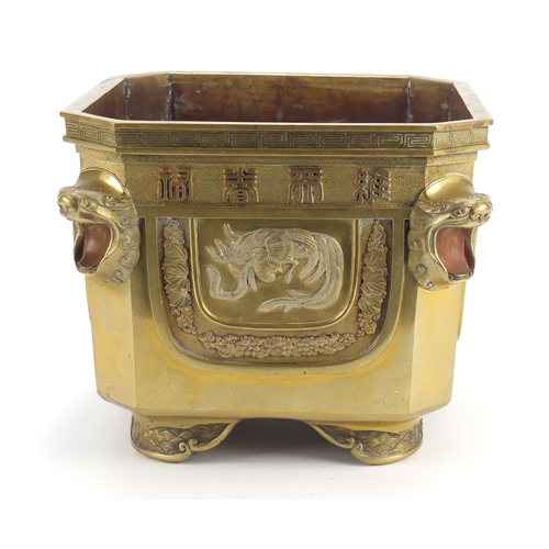 379 - Chinese bronze planter with lion head handles, finely cast panels of animals and calligraphy, charac... 