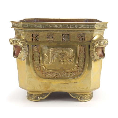 379 - Chinese bronze planter with lion head handles, finely cast panels of animals and calligraphy, charac... 