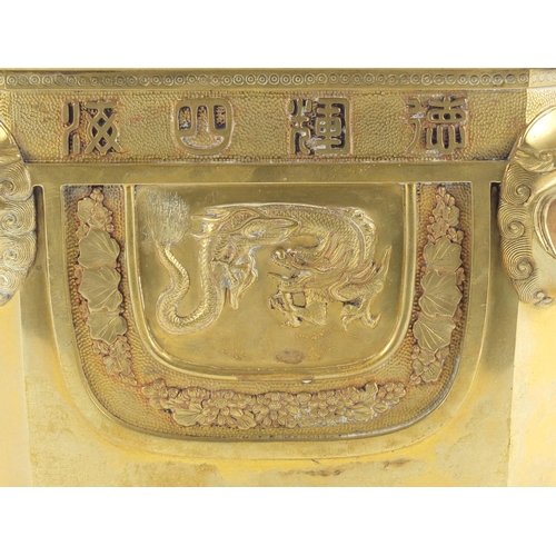 379 - Chinese bronze planter with lion head handles, finely cast panels of animals and calligraphy, charac... 