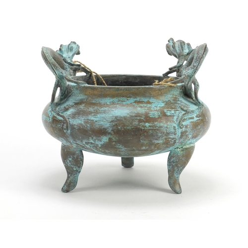 382 - Chinese bronze tripod incense burner with twin handles, character marks to the base, 15.5cm high x 1... 