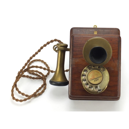 68 - Vintage oak and brass wall telephone, 24.5cm high