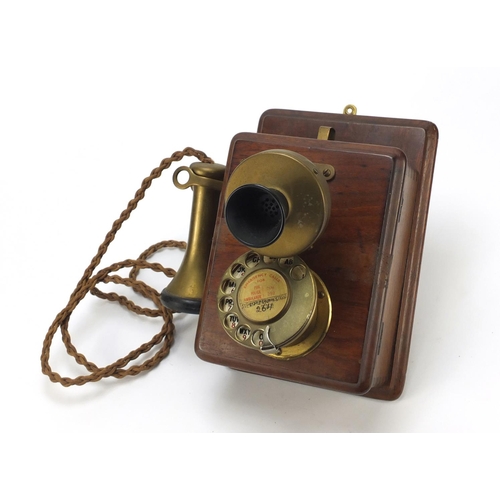 68 - Vintage oak and brass wall telephone, 24.5cm high