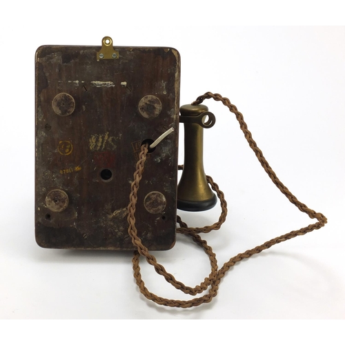 68 - Vintage oak and brass wall telephone, 24.5cm high