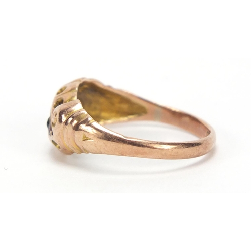 679 - Edwardian 9ct gold ring with scroll shoulders, set with pink and green stones, size M, 1.8g