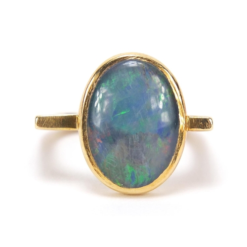 646 - Designer 18ct gold cabochon opal ring, size I, GH Sheffield 1989, 5.7g