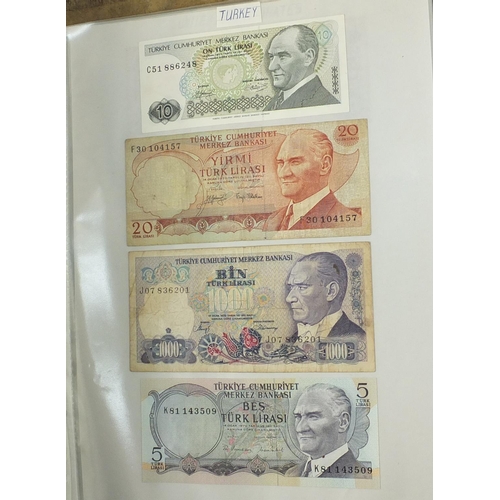 202 - Album of world banknotes arranged in an album including Scotland, Spain and Mexico