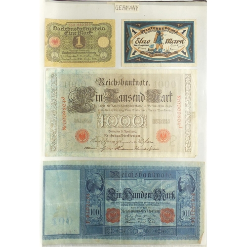 203 - Album of world bank notes arranged in an album including China, Austria, Cambodia and Germany