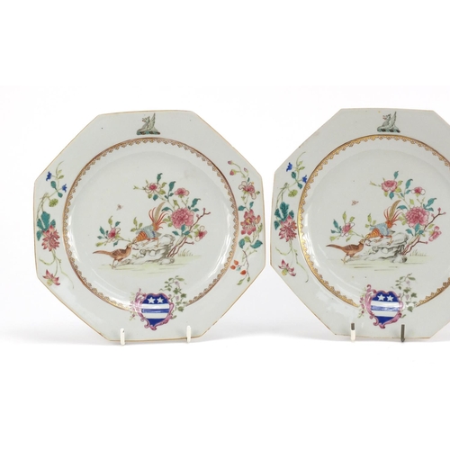 307 - Two Chinese porcelain armorial plates and a soup bowl, each finely hand painted in the famille rose ... 