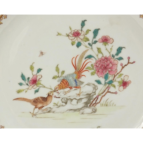 307 - Two Chinese porcelain armorial plates and a soup bowl, each finely hand painted in the famille rose ... 