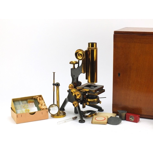 27 - Victorian brass monocular microscope with accessories and case by W Watson and Sons of London, numbe... 