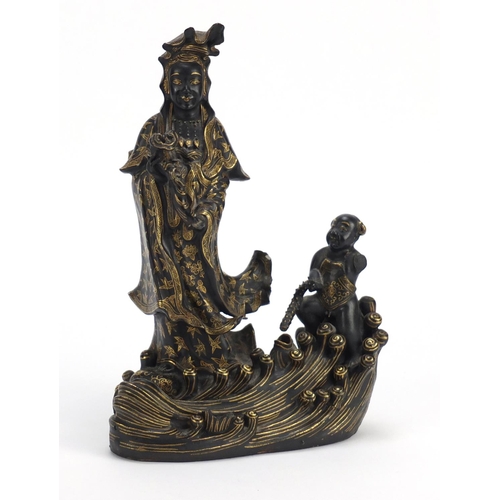 377 - Chinese porcelain figure of Guanyin and a child, 24.5cm high