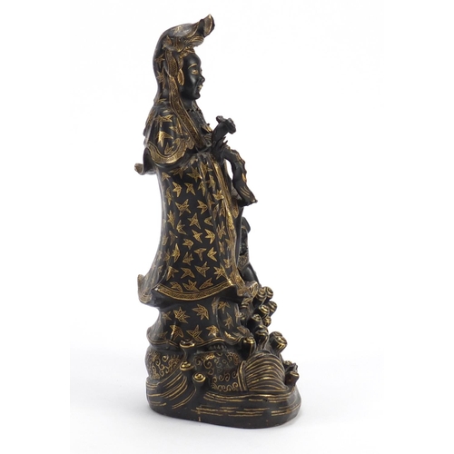 377 - Chinese porcelain figure of Guanyin and a child, 24.5cm high