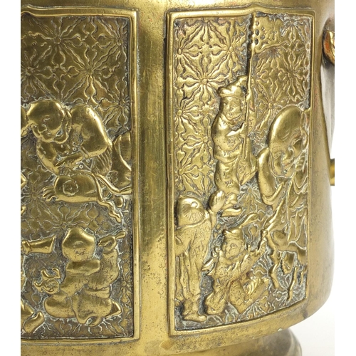 383 - Chinese bronze planter with naturalistic handles, cast in relief with panels of figures, character m... 