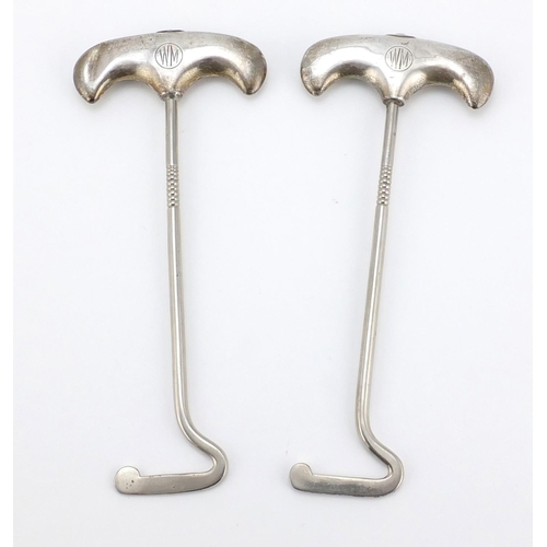 611 - Pair of Edawardian silver handled boot pulls, Birmingham 1916, 24.5cm in length